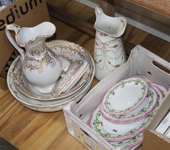 A Staffordshire Victorian gilt and white four piece toilet set, another washstand set & a quantity of oval platters